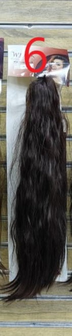 Claw clip ponytail curly