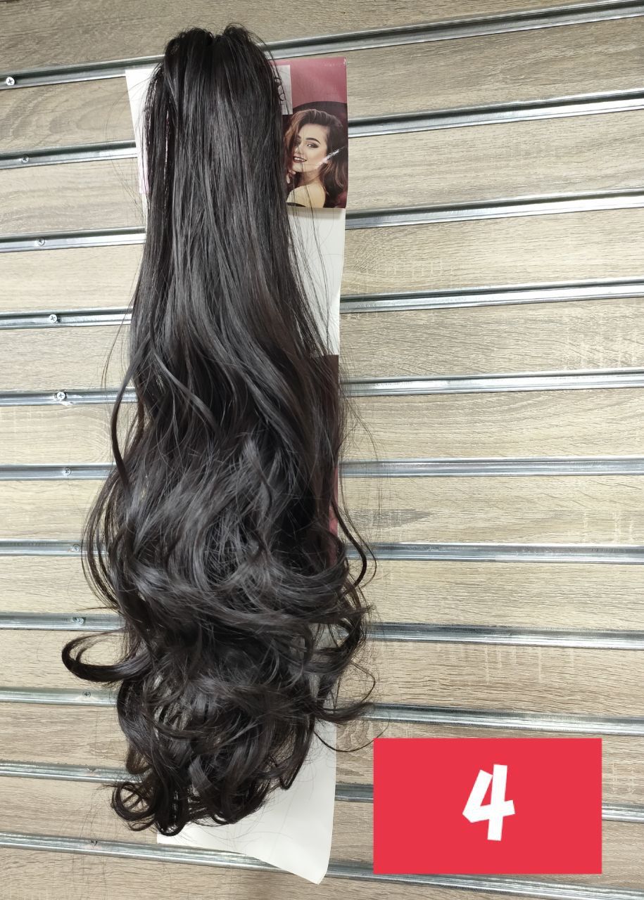 Claw clip ponytail wavy tall